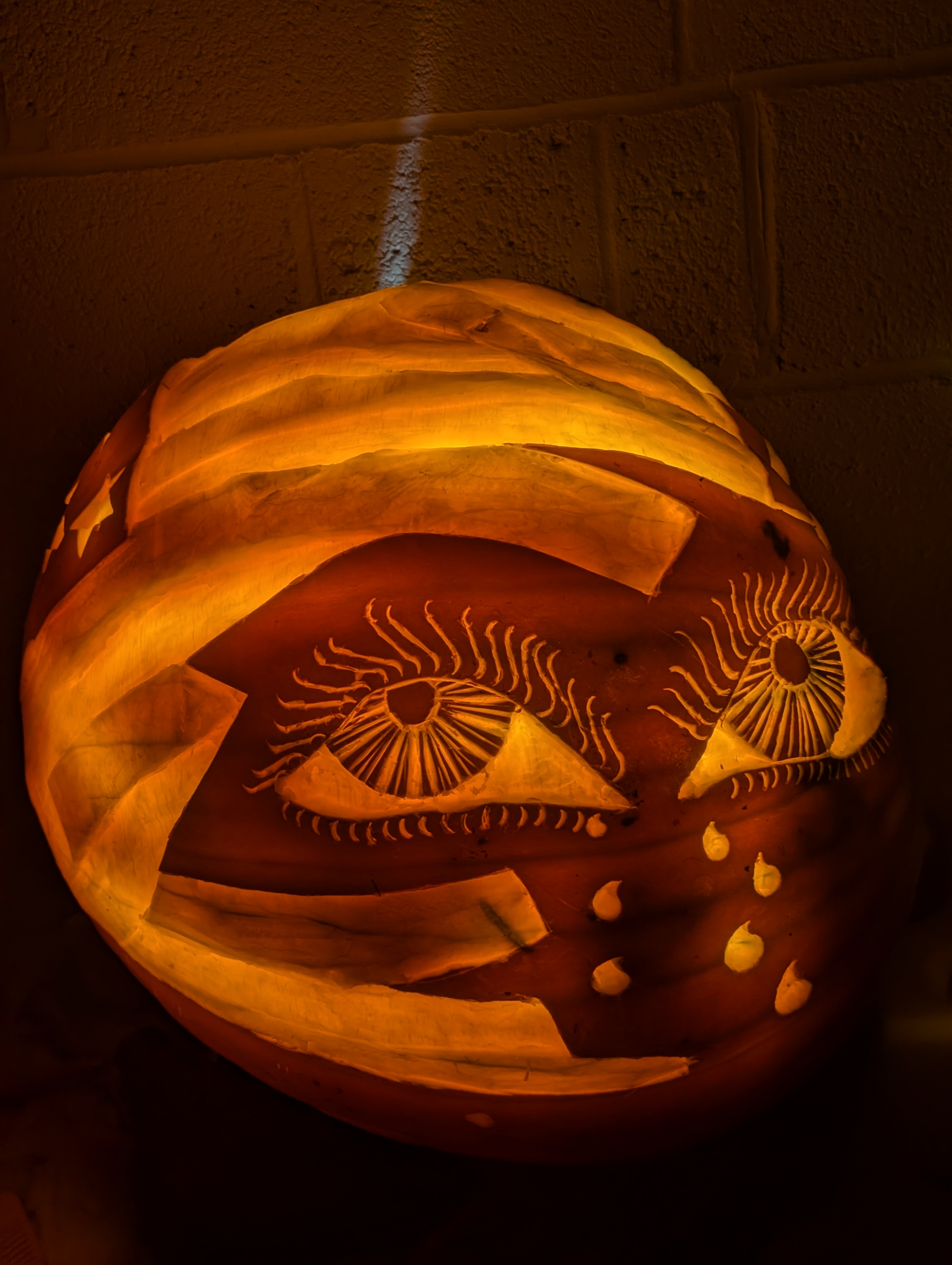Pumpkin carved 2025, a hug with tattered glory: the face showing acceptance and armoring for the journey ahead.